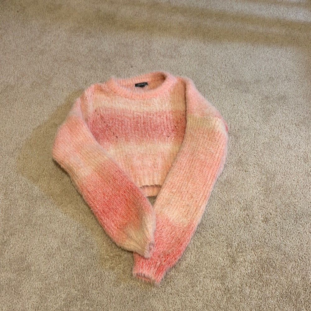 Fluffy sweater, cropped, pink with white stripes.